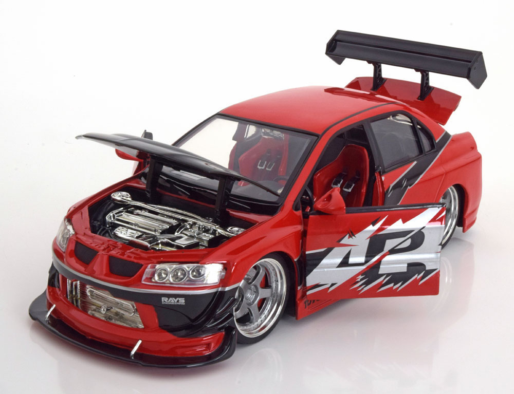 Модель fast. Mitsubishi Lancer Evolution VII Форсаж 3. Jada Mitsubishi Lancer Evolution 1:32. Митсубиси Лансер Эволюшн Форсаж 3. Митсубиси Лансер Эво 9 Форсаж 3.